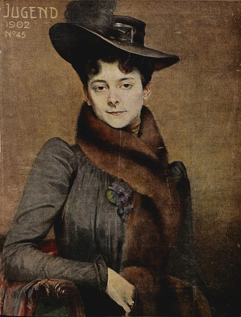 Signora con sciarpa di pelliccia